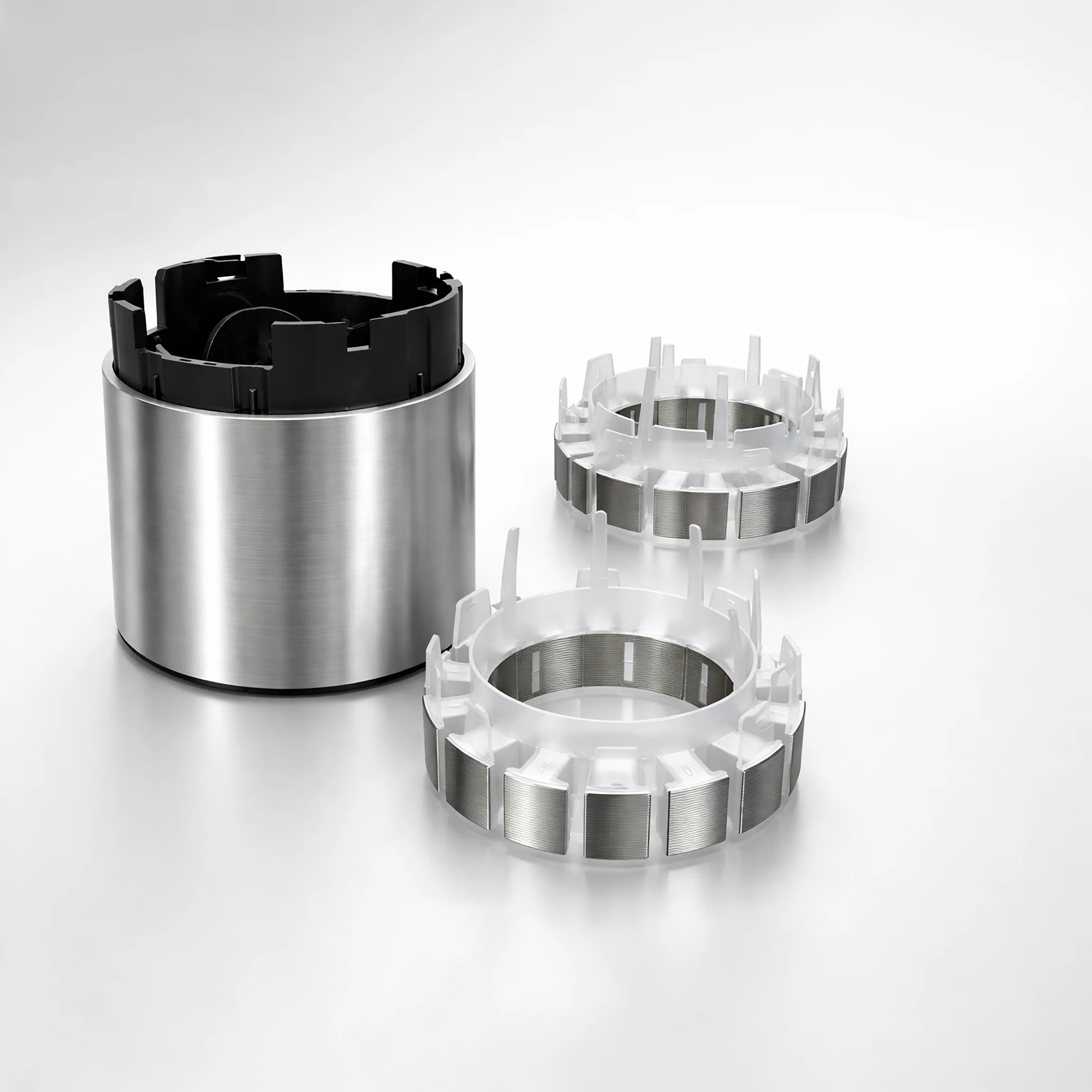 Motors, complex insert injection molding