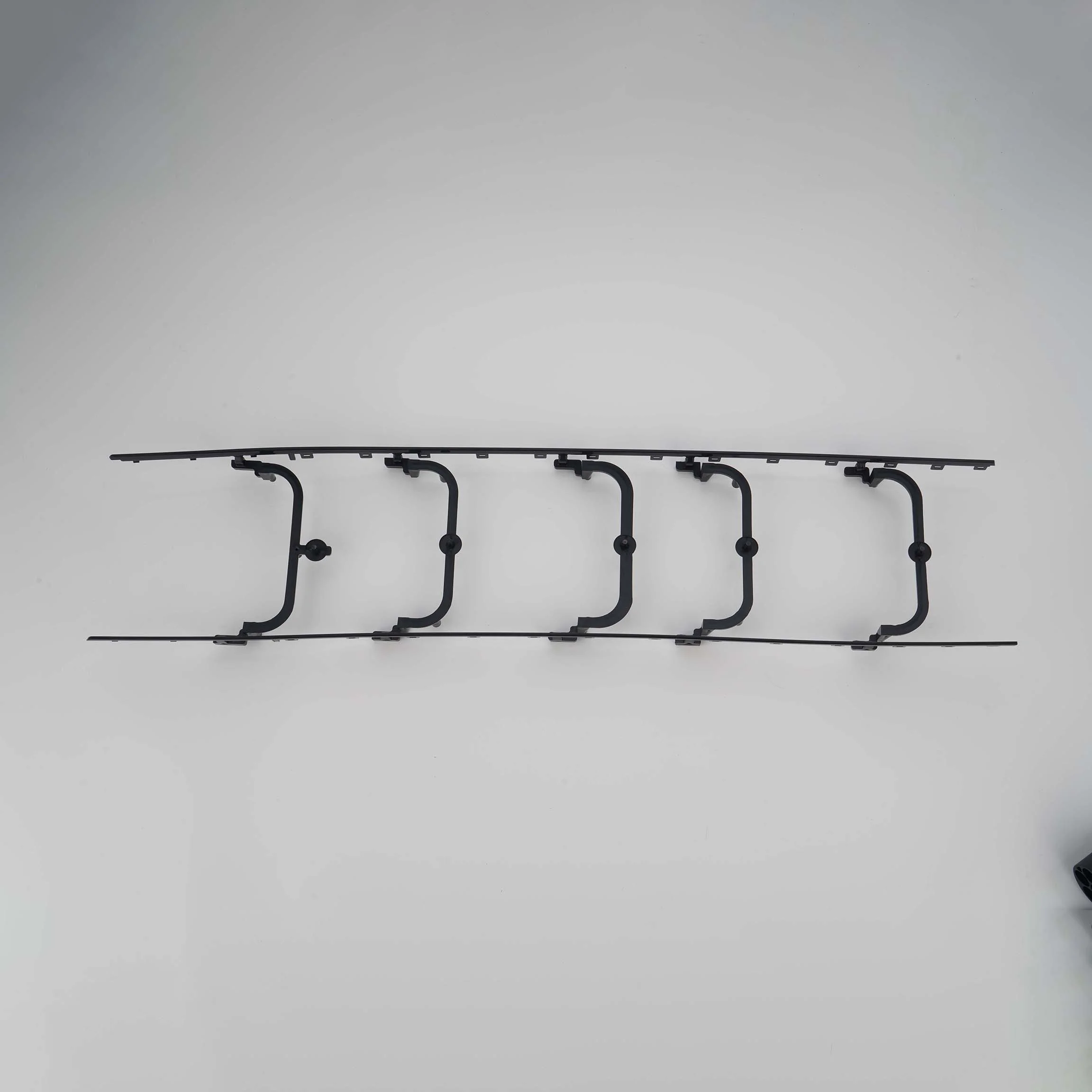 Instrument panel trim strip 2, multi-point glue injection for sequence valve