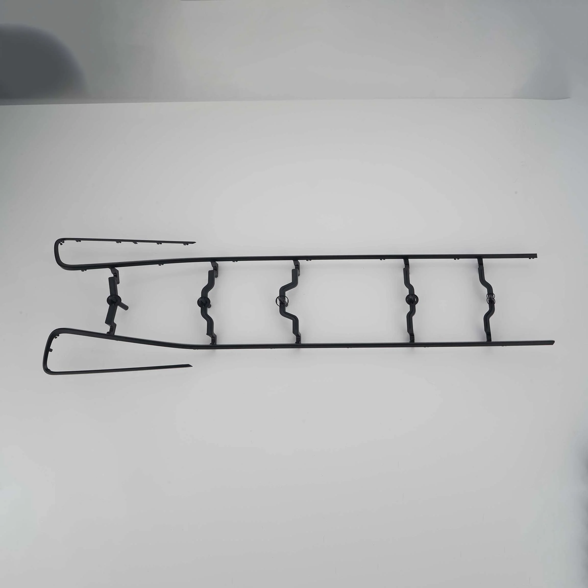 Dashboard trim strip, multi-point glue injection for sequence valve